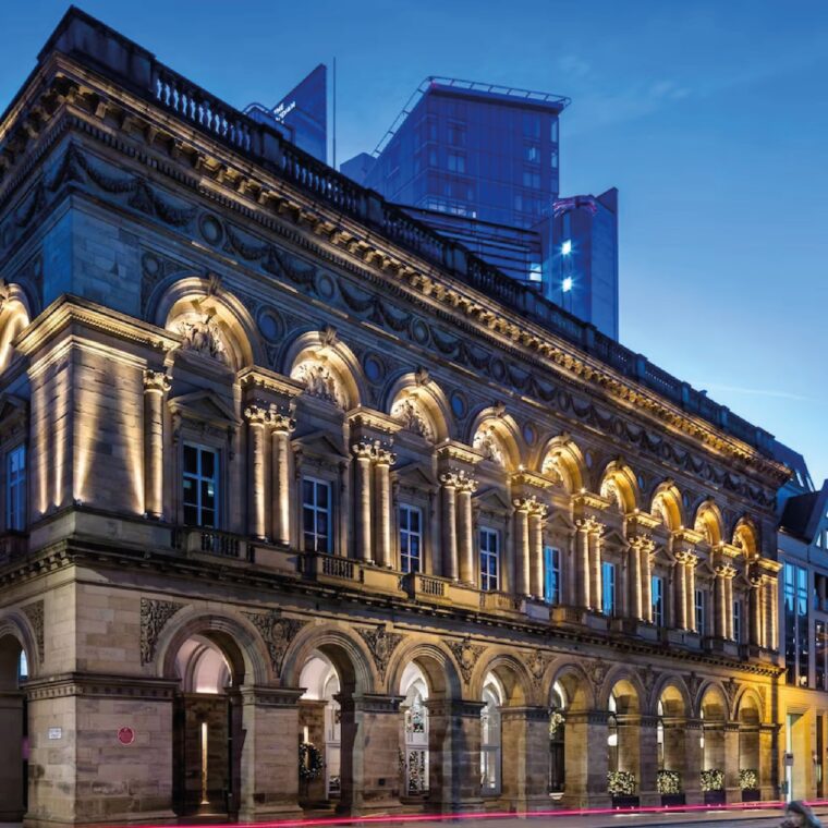 Hotels - Angled shot of an old hotel at night